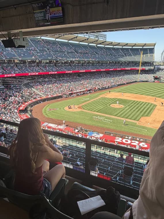 My daughter taking in the ballpark from the upper deck.